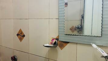 Shower, bidet, towels, soap