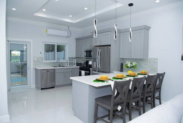 Fridge, microwave - Modern & Cozy 2-Bedroom Apartment (Nassau)