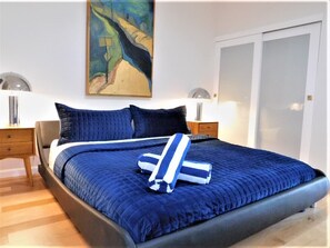 2 bedrooms, desk, iron/ironing board, travel crib