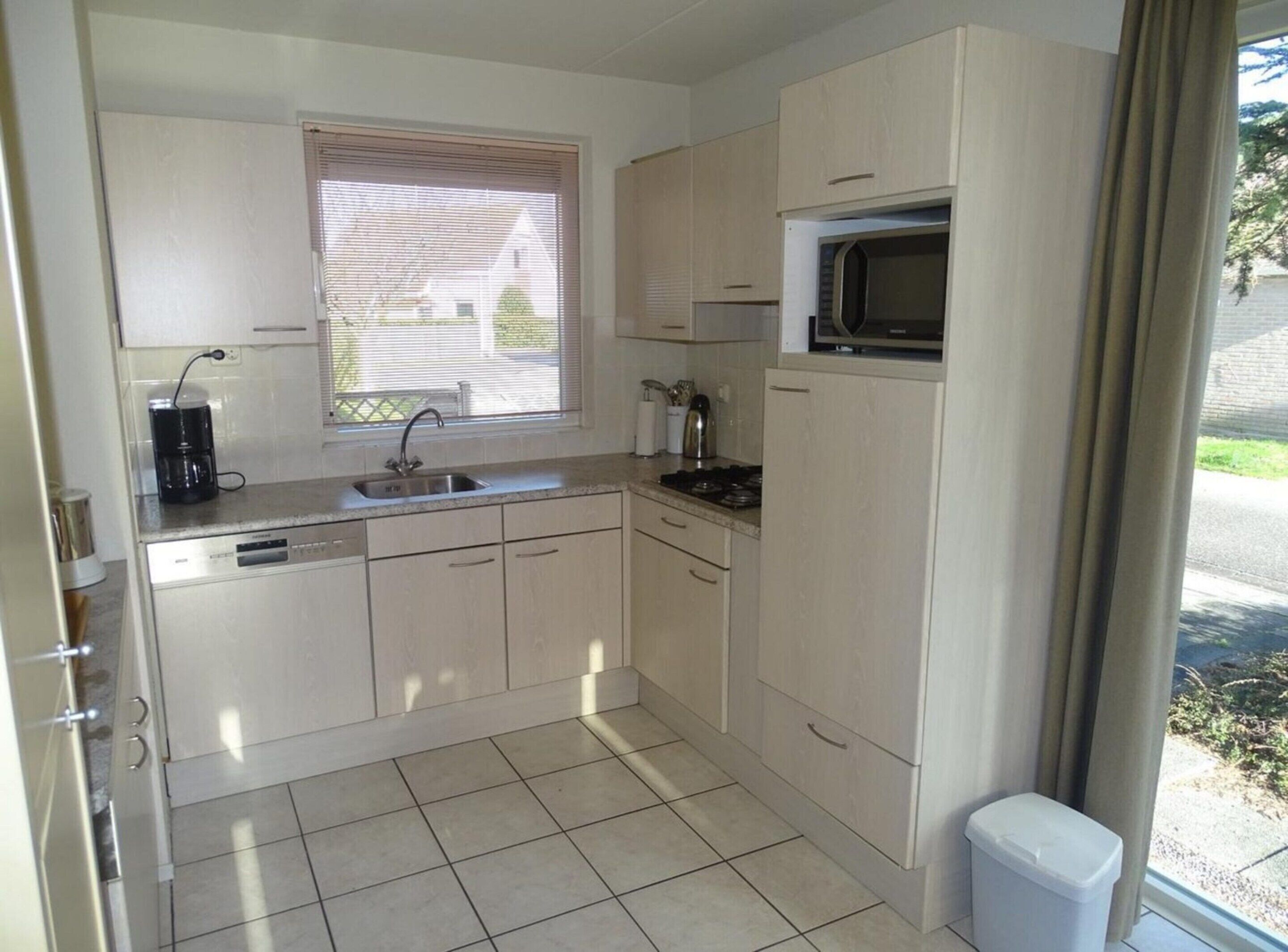 Fridge, microwave, dishwasher, coffee/tea maker