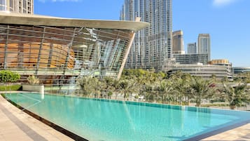 2 outdoor pools, open 9:00 AM to 9:00 PM, free cabanas, pool umbrellas