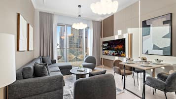 Luxury Apartment, 1 Bedroom, Private Pool, City View | Living area | 55-inch Smart TV with digital channels, Netflix, toys