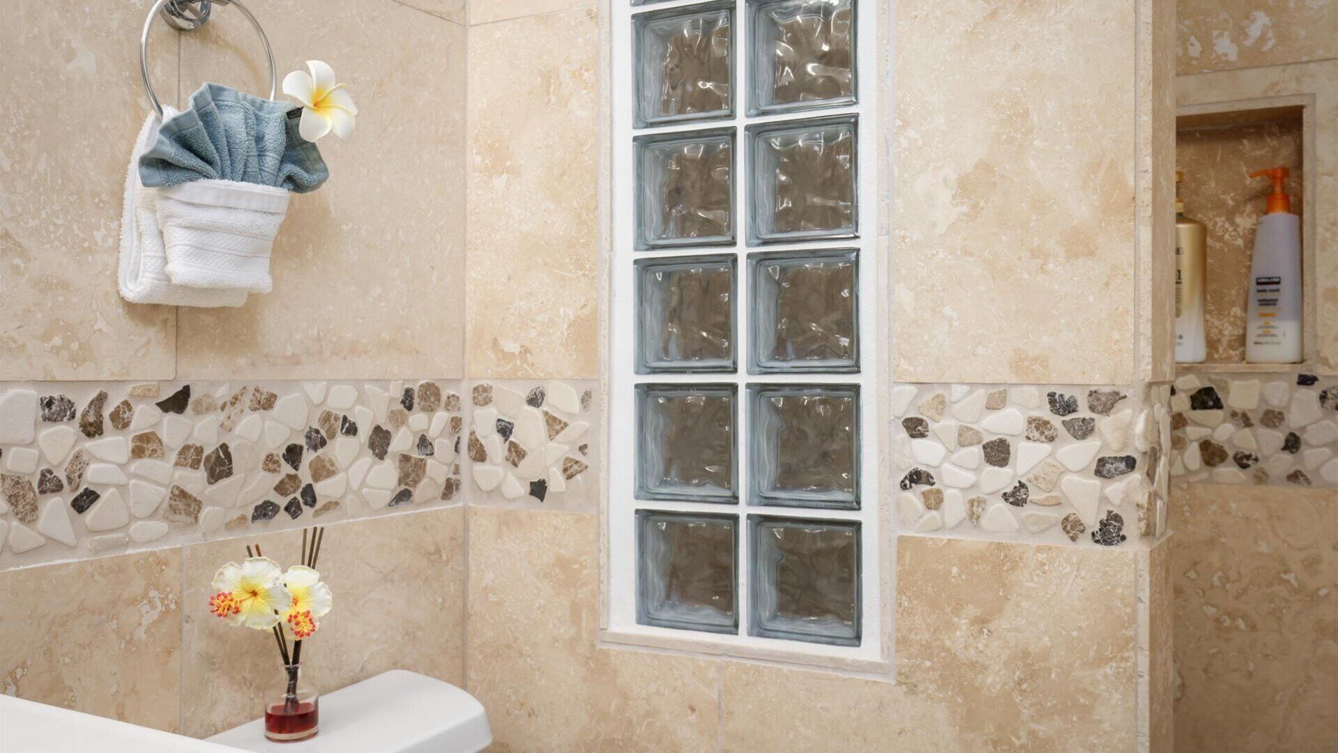 Shower, hair dryer, towels