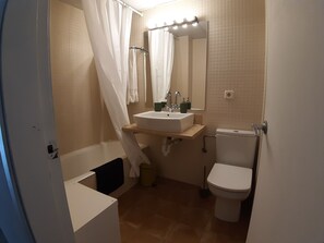 Shower, towels, soap, toilet paper