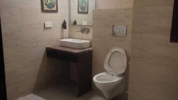 Deluxe Room, City View | Desk, laptop workspace, blackout curtains, iron/ironing board