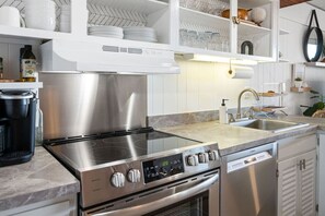 Fridge, microwave, oven, stovetop - 68th St Oceanfront Condo with Pool (Ocean City)