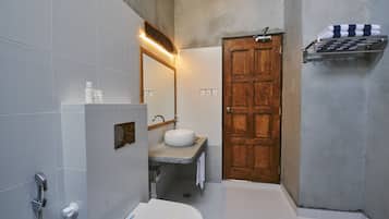 Shower, hair dryer, slippers, towels