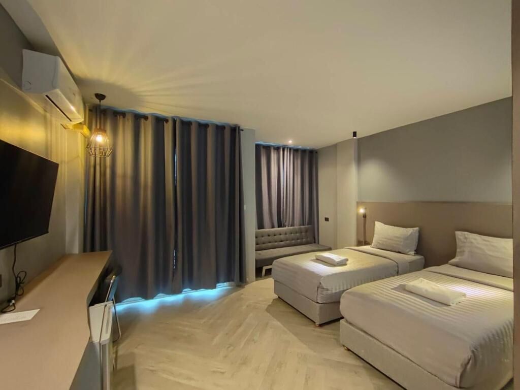 Chambre Deluxe avec lits jumeaux, balcon | Bureau, espace de travail pour ordinateur portable