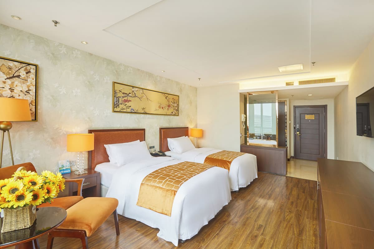 Elite Twin kamer | 2 slaapkamers, donzen dekbedden, een minibar met enkele gratis items