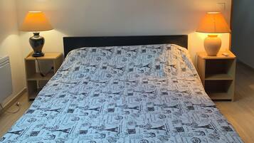 2 dormitorios, tabla de planchar con plancha, wifi y ropa de cama