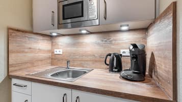 Fridge, microwave, coffee/tea maker, electric kettle