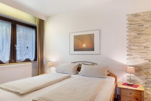 2 quartos, Wi-Fi de cortesia, roupa de cama