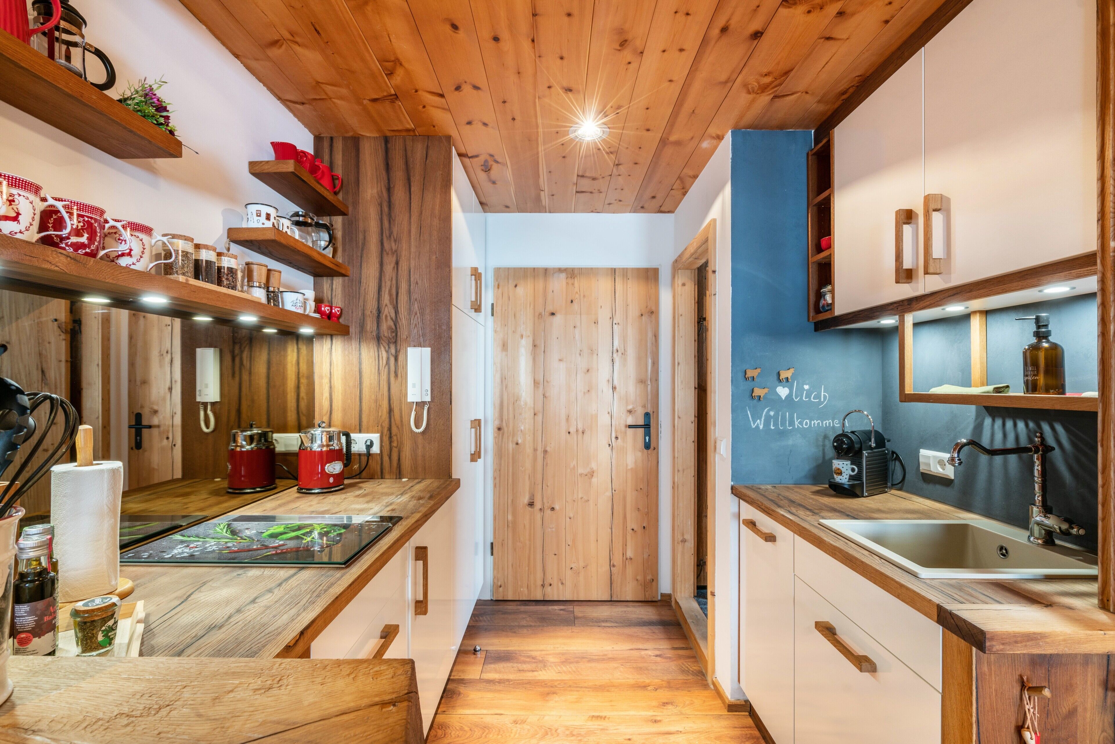 Fridge, stovetop, dishwasher, coffee/tea maker