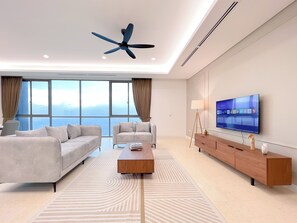 아파트, 침실 3개 | 거실 공간 | 케이블 채널 시청이 가능한 40인치 평면 TV