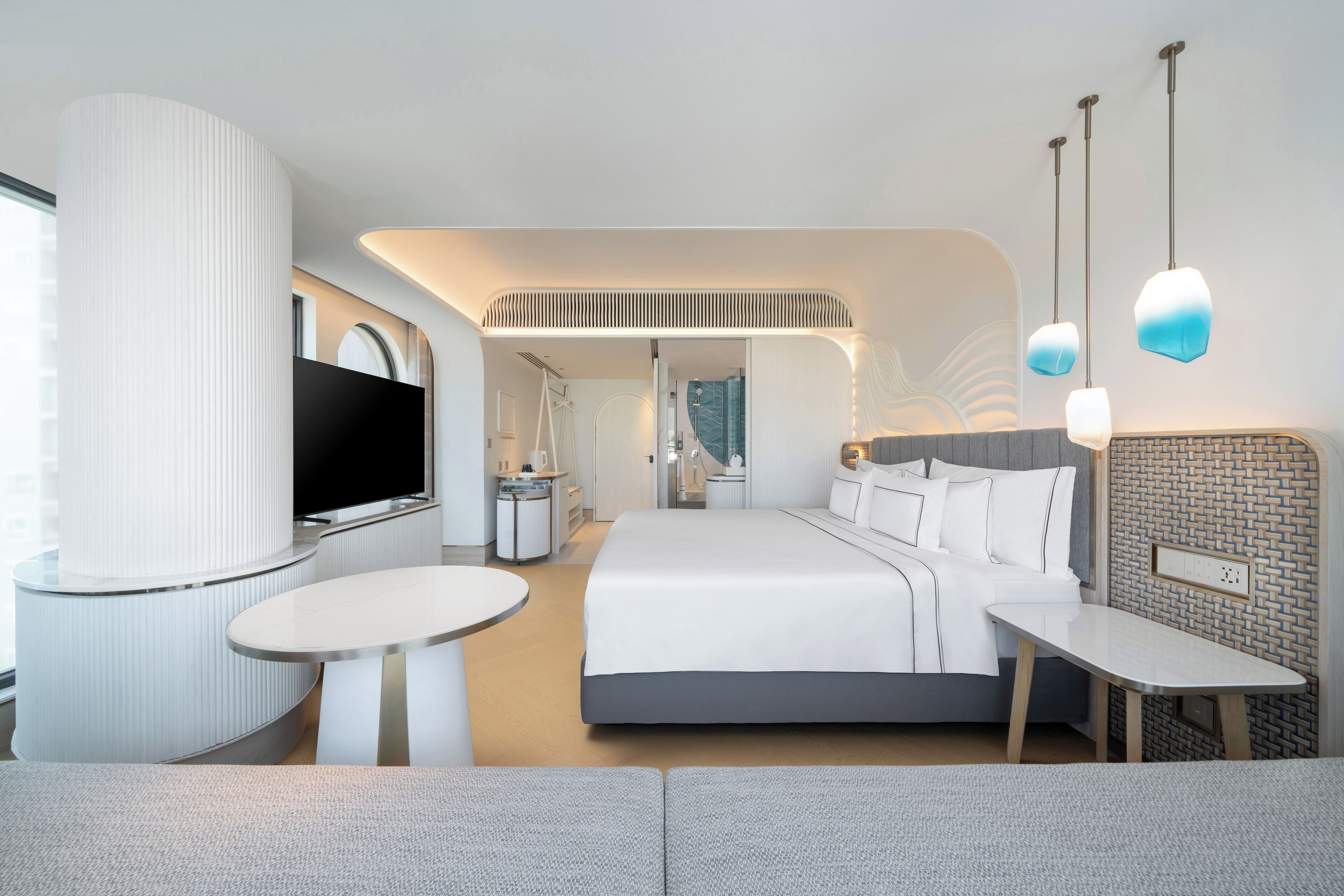 Luxe beddengoed, donzen dekbedden, een minibar, een kluis op de kamer