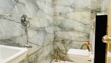 Deluxe Double Room, City View | Bathroom | Shower, towels, soap, shampoo
