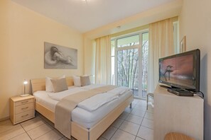 1 slaapkamer, een strijkplank/strijkijzer, reisbedje, gratis wifi