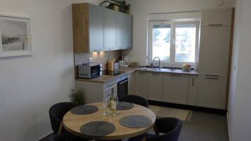 Apartment (Two Bedroom Apartment) | Private kitchen | Fridge