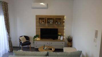 Apartment (Two Bedroom Apartment) | Living room | 32-inch flat-screen TV with cable channels