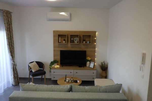 Apartment (Two Bedroom Apartment) | Living room | 32-inch flat-screen TV with cable channels