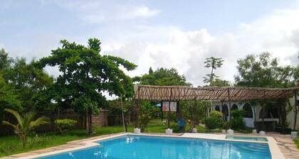 Charming 4 Bedroom bungalow in Highly Sought After Tiwi Beach with pool.