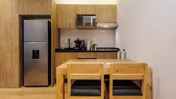 Fridge, microwave, stovetop, cookware/dishes/utensils