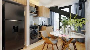 Fridge, microwave, stovetop, cookware/dishes/utensils