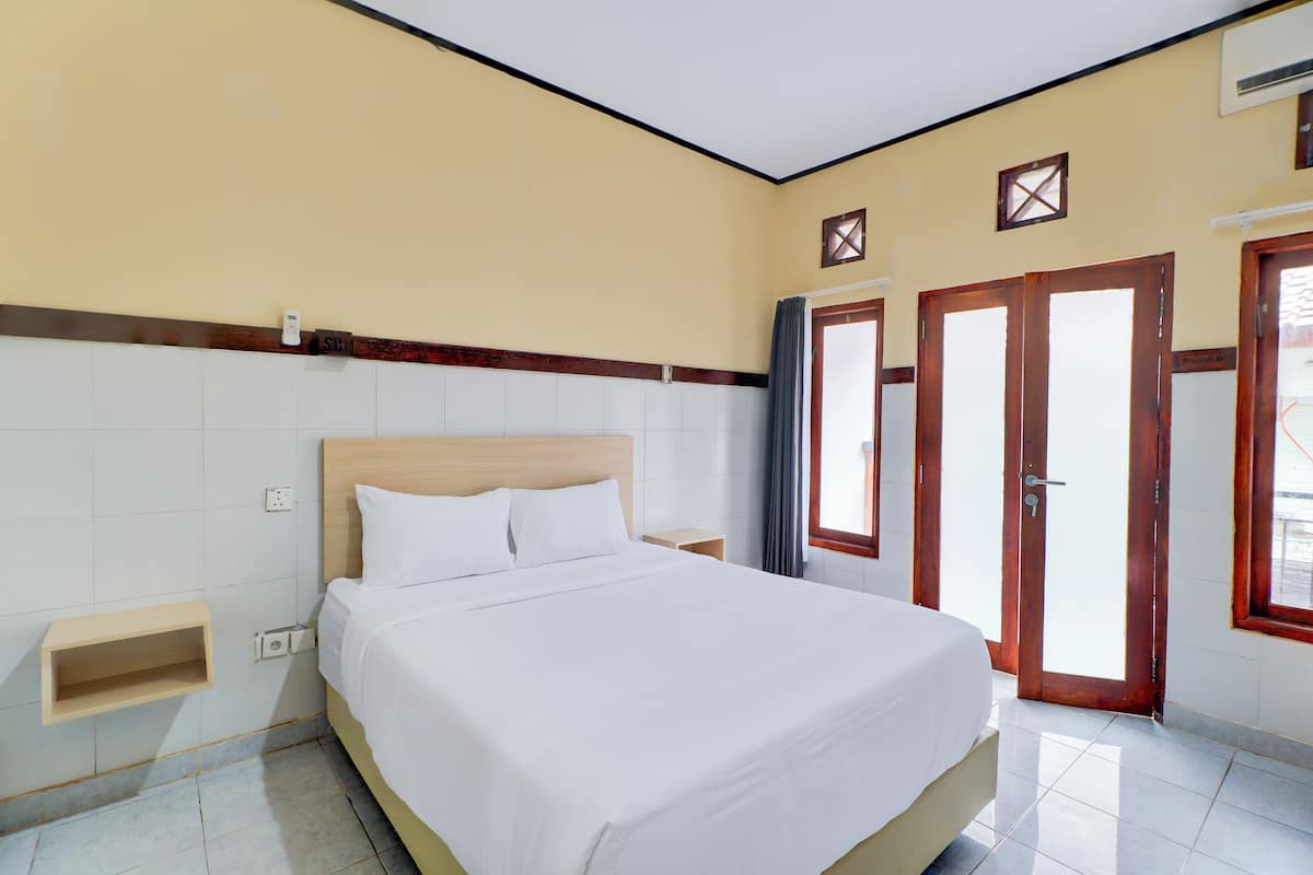 Habitación doble Deluxe | Ropa de cama de alta calidad, wifi gratis y ropa de cama