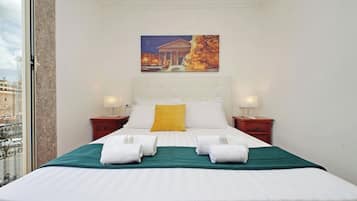 Economy Room | In-room safe, desk, blackout drapes, iron/ironing board