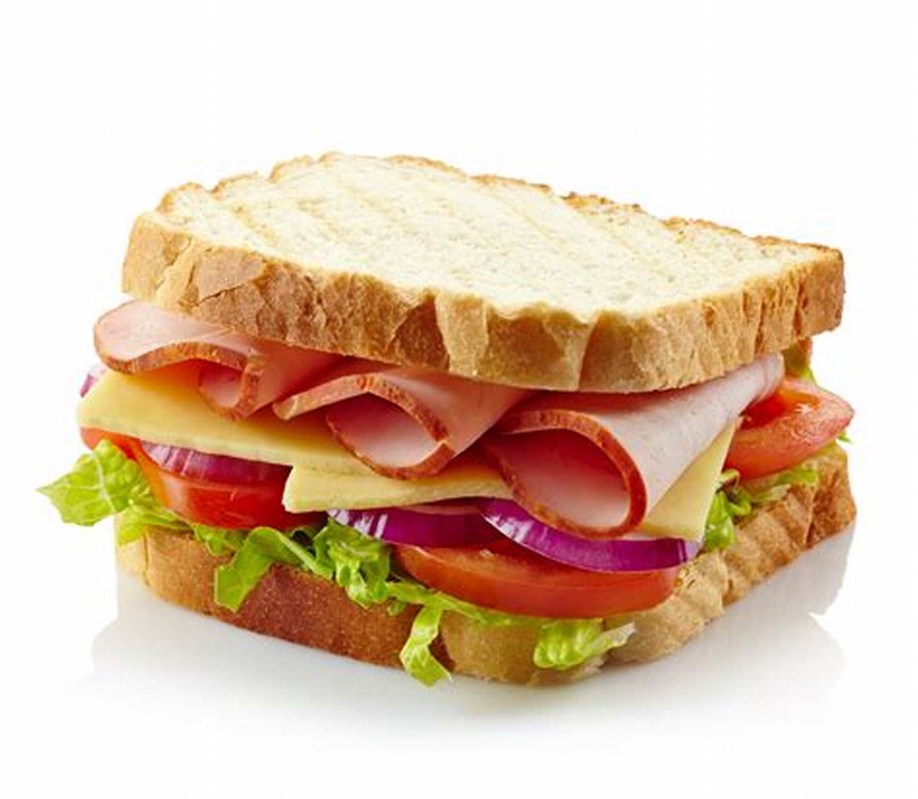 A sandwich with multiple layers of ingredients.