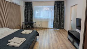 1 habitación, tabla de planchar con plancha, wifi y ropa de cama