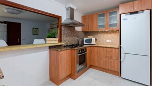 Apartemen | Dapur pribadi | Kursi makan untuk bayi