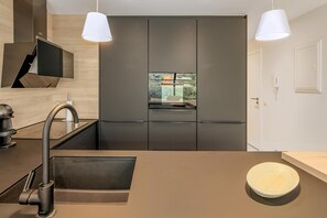 Fridge, microwave, stovetop, coffee/tea maker