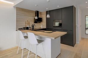 Fridge, stovetop, coffee/tea maker