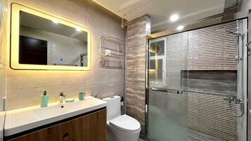 Shower, eco-friendly toiletries, hair dryer, bidet