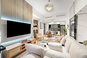 TV - Dubai 2BR Retreat | Pool, Gym, Parking | Walk to Shops & Cafes (Dubai Hills Estate)