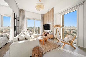 TV - Dubai 2BR Retreat | Pool, Gym, Parking | Walk to Shops & Cafes (Dubai Hills Estate)