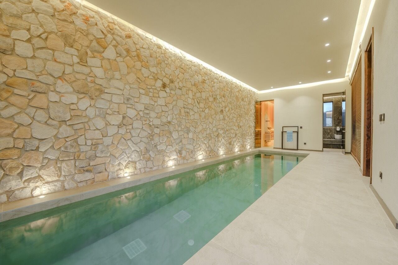 Indoor pool, outdoor pool, pool umbrellas, sun loungers