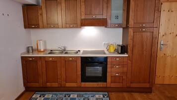 Apartment | Private kitchen | Fridge, oven, electric kettle, cookware/dishes/utensils