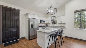 Townhome, 4 Bedrooms | Private kitchen | Fridge, oven, coffee/tea maker, electric kettle