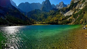 A mountain landscape with a clear lake and rocky terrain. - Amazing Apartment in Tyrol With Sauna (Lermoos)