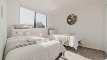 2 habitaciones, tabla de planchar con plancha, wifi y ropa de cama