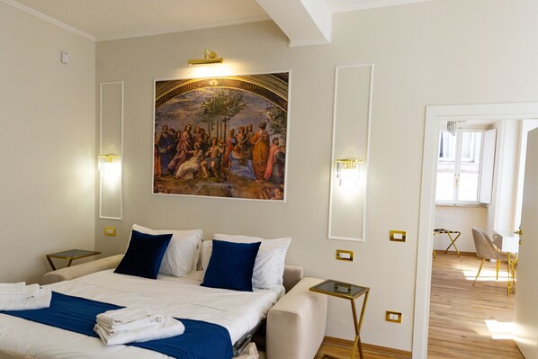 A hotel room with a large bed, two bedside tables, a painting on the wall, and a view of the adjacent room. - Golden palace luxury guest house (Rome)