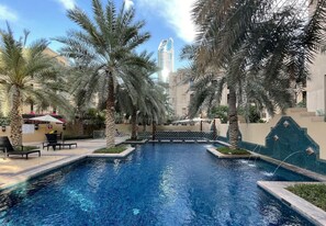 Pool - Cozy 1BR Apartment | Close to Mall, Metro, and Dining (Dubai)