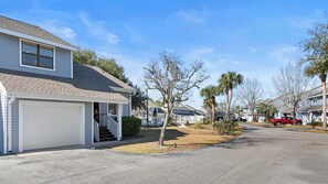 There's space for two cars at this home. You can park one in the garage and one on the driveway. Additional first-come, first serve parking is available in parking spaces throughout the community.