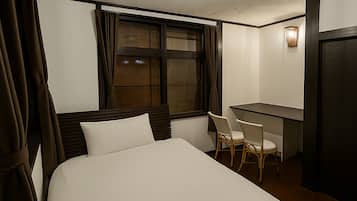 Basic-Doppelzimmer, Stadtblick | Daunenbettdecken, kostenloses WLAN, Bettwäsche