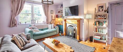 TV, fireplace, books, offices