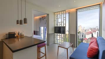Suite, 1 King Bed, City View | Living area | 42-inch LCD TV with digital channels