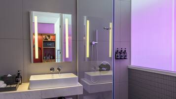 Suite, 1 King Bed, City View | Bathroom | Shower, free toiletries, hair dryer, slippers