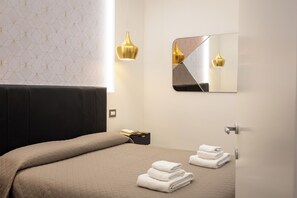 2 chambres, fer et planche à repasser, Wi-Fi, draps fournis